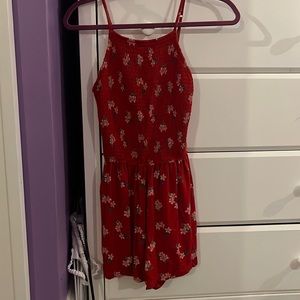 Red with flowers on it Hollister romper